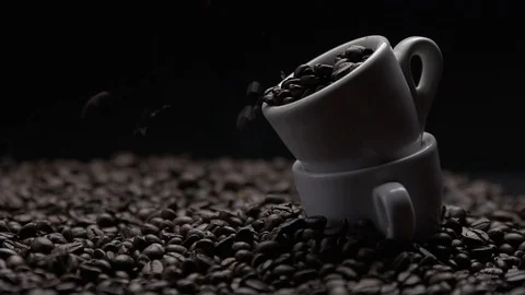 Coffee beans fall into a cup Stock Footage 120757680