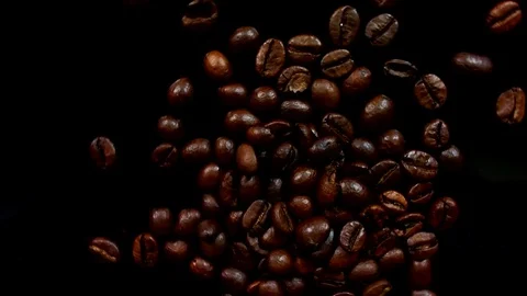 Coffee beans fall. Real motion. Stock Footage 75948244