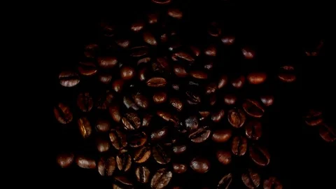 Coffee beans fall. Real motion. Stock Footage 75948802