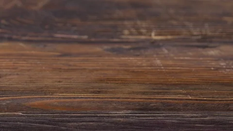 Coffee beans fall in slow motion on the board Stock Footage 113084475