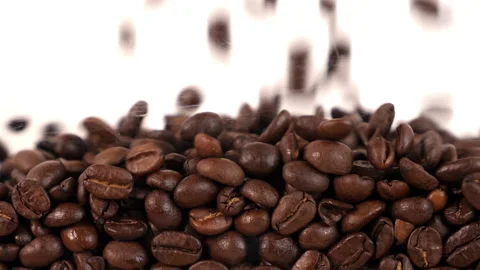 Coffee beans fall in slow motion and cover the whole screen Stock Footage 167198016
