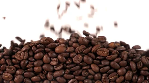 Coffee beans fall in slow motion and cover the whole screen Stock Footage 167198027