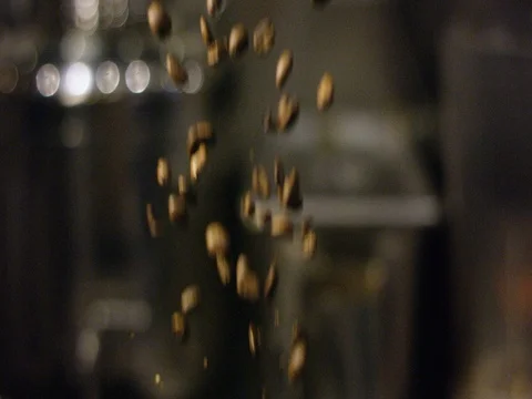 Coffee beans falling against blur background 스톡 동영상 83185495