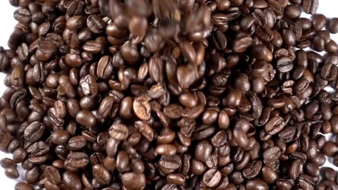 Coffee Beans Falling against White Background, Slow Motion 250 fps Stock Footage 84148598