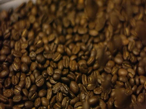 Coffee beans falling and forming a heap Stock Footage 83185523
