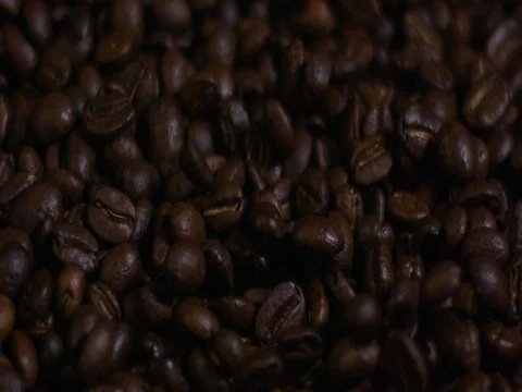 Coffee beans falling and forming a heap 스톡 동영상 83185583