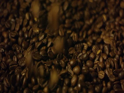Coffee beans falling and forming a heap Stock Footage 83303810
