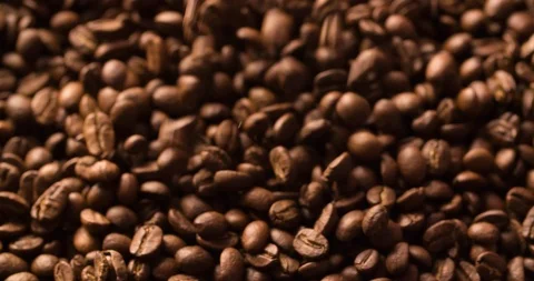 Coffee Beans Falling on background Slow Motion close up shot Stock Footage 98243332