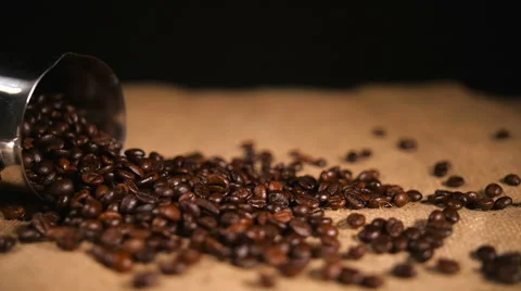 Coffee Beans Falling on Bagging from Cezve Stock Footage 60244001