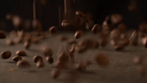 Coffee beans falling on board close up macro shot Slow Motion video Stock Footage 102618290