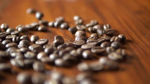 Coffee beans falling commercial in super slow motion Video stock 166821114