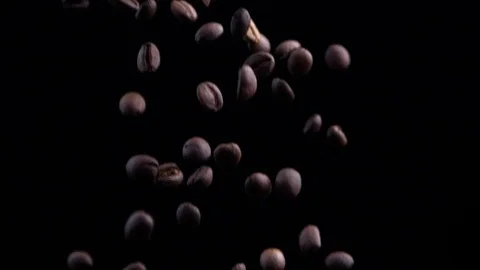 Coffee Beans falling down with black background. 库存影片 122057124