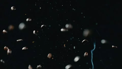 Coffee beans falling down in Slow Motion Stock Footage 253408196