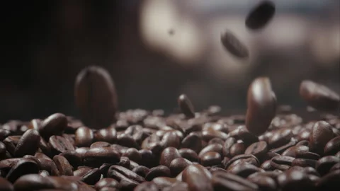 Coffee beans falling down in slow motion Video stock 311277169