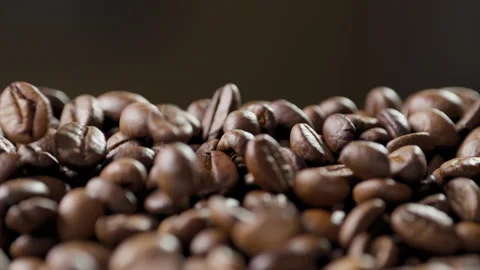 Coffee beans falling onto a heap 動画素材 316072131