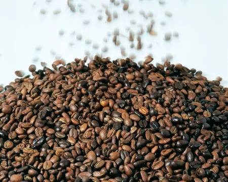 Coffee beans falling Stock Photos