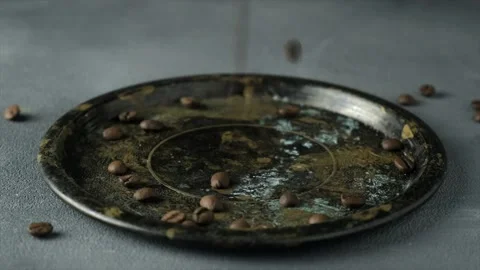 Coffee beans falling in a plate Stock Footage 132868378