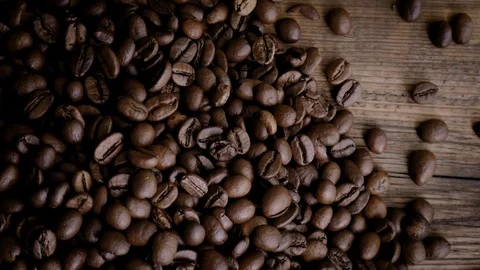 Coffee beans falling, top view Stock Footage 107886937