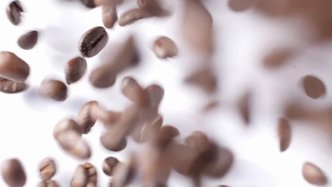 Coffee Beans falling onto White Background 2 Video stock 99123944