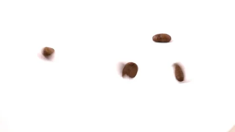 Coffee beans falling on the white table Stock Footage 91333933
