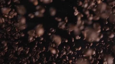 Coffee beans fly up close up Stock Footage 128546336