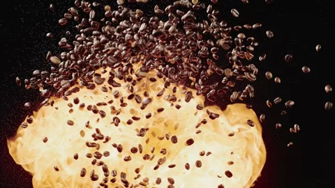 Coffee Beans Fly Through The Air Near A Flame Stock Footage 254997650