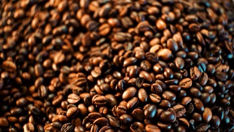 Coffee beans in the foreground cinematic Stock Footage 148386749