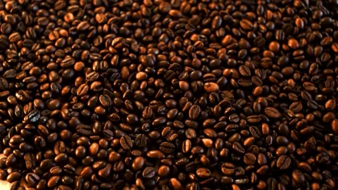 Coffee beans in the foreground Stock Footage 148386740