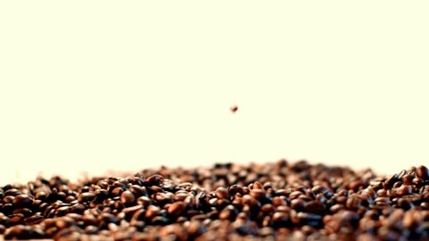 Coffee beans in the foreground Stock Footage 148386759