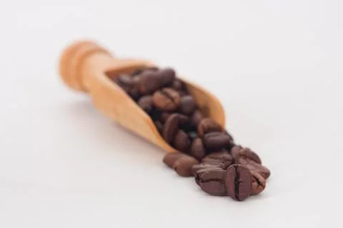 Coffee beans in the foreground Stock-Fotos