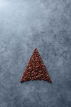 Coffee beans in a form of an arrow Foto stock