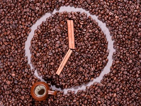 Coffee beans in the form of clock Stock Photos