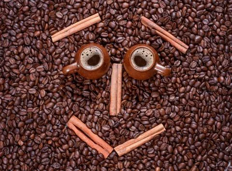 Coffee beans in the form of a smiling face Stock Photos