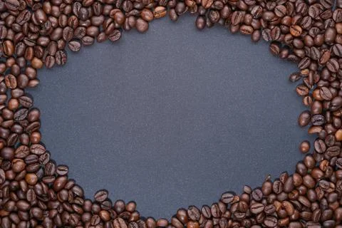 Coffee beans frame on dark background Stock Photos
