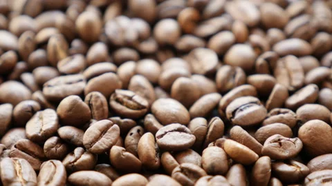 Coffee beans freshly roasted in slow motion. Stock Footage 133605073