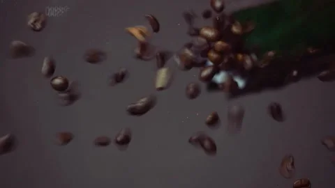 Coffee beans on glass table Stock Footage 141213226