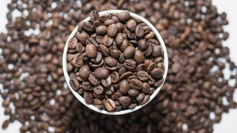 Coffee beans in a glass,top view,close-up,aromatic coffee,collected roasted  Stock Photos
