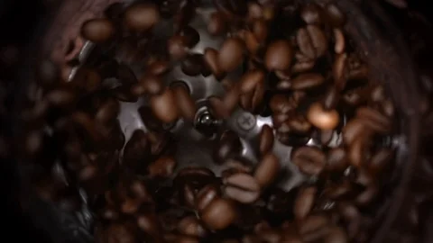 Coffee beans grind in a coffee grinder, barista prepare ingredients for work in Video stock 116495813