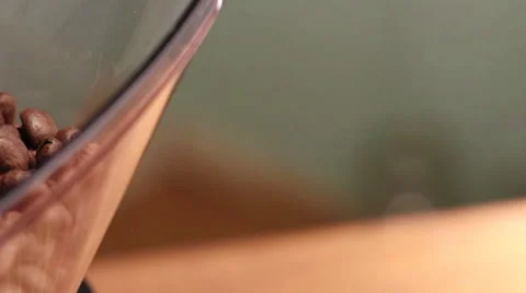 Coffee Beans in a Grinder Hopper - Pan Right to Center Stock Footage 61404391