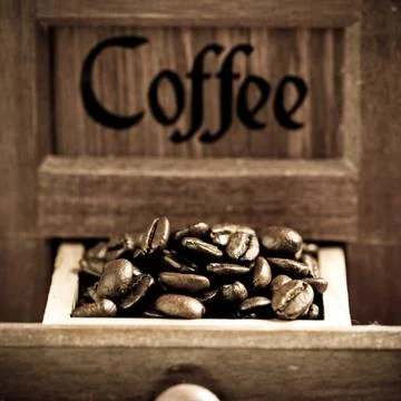 Coffee beans in grinder Stock Photos