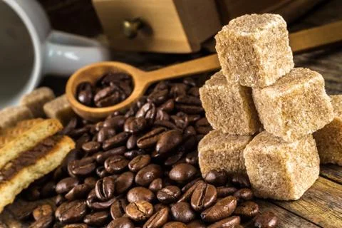 Coffee beans with grinder Stock Photos