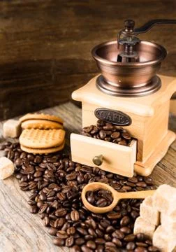 Coffee beans with grinder Stock Photos