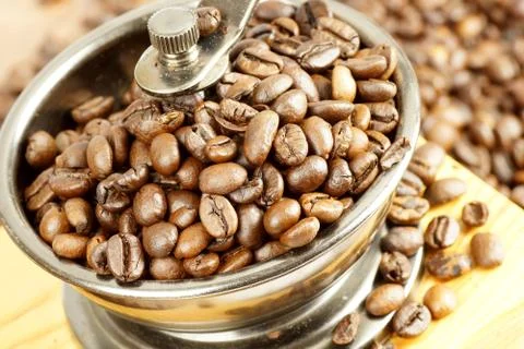 Coffee beans in the grinder Stock Photos