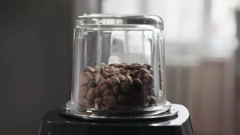 Coffee Beans Grinding Inside Coffee Grinder Close Up Vídeo Stock 330537129