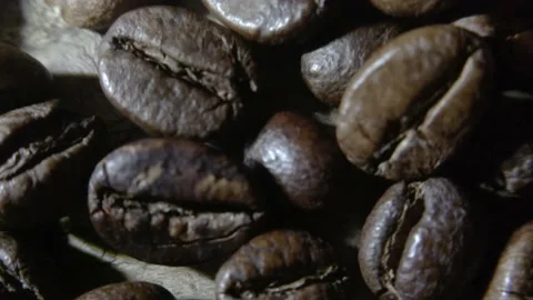 Coffee beans that have been fried and ready to be mashed to make coffee drinks Stock Footage 227092904