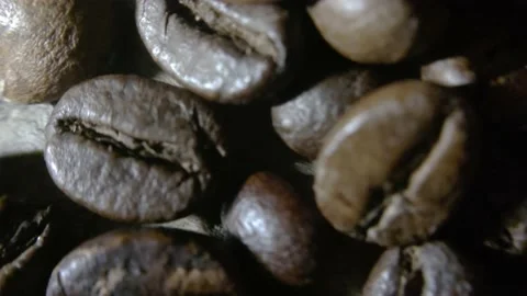 Coffee beans that have been fried and ready to be mashed to make coffee drinks Stock Footage 227096709