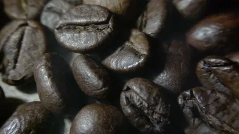 Coffee beans that have been fried and ready to be mashed to make coffee drinks Stock Footage 227101006
