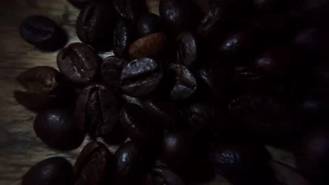 Coffee beans that have been fried and ready to be mashed to make coffee drinks Stock Footage 227101089