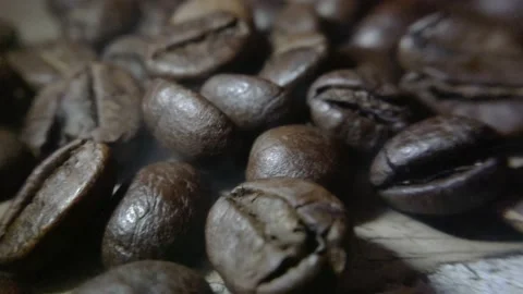 Coffee beans that have been fried and ready to be mashed to make coffee drinks Stock Footage 227101188