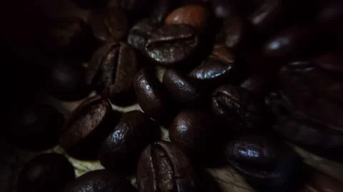 Coffee beans that have been fried and ready to be mashed to make coffee drinks Stock Footage 227101207